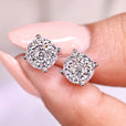 Portuguese cut diamond earrings with 4 prong setting.
