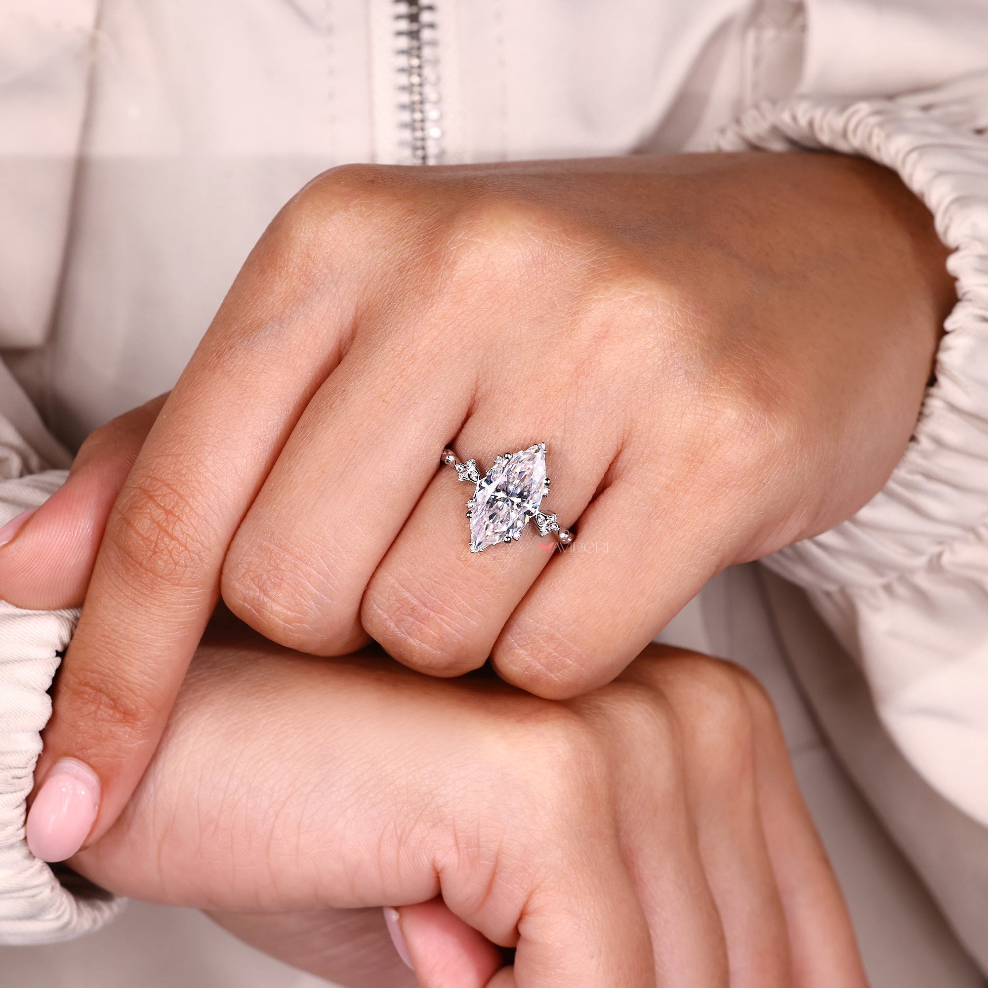 Custom moissanite ring shaped with a refined handcrafted finish.