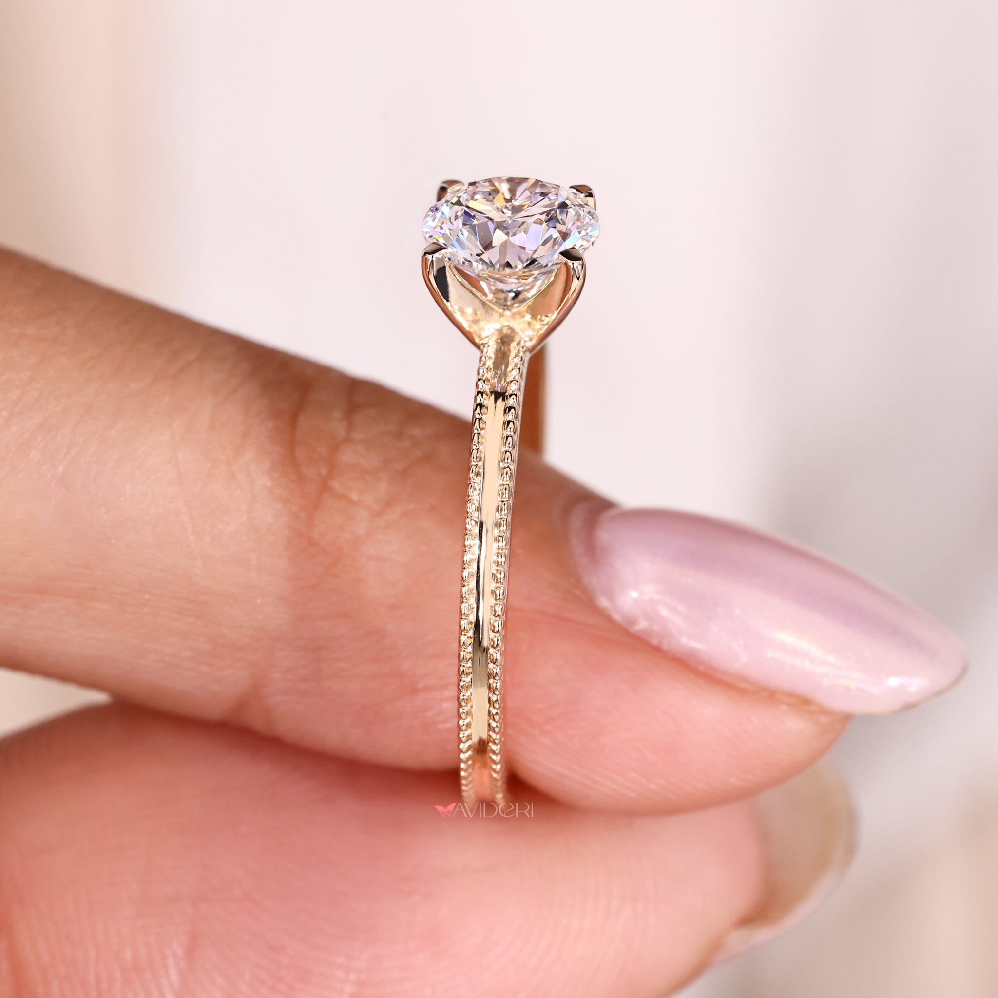 Unique engagement ring with milgrain and prong details.