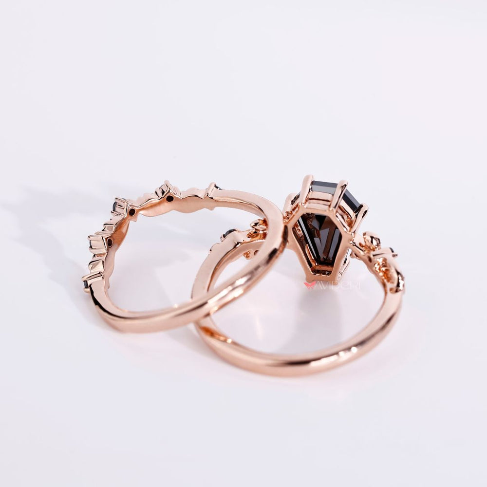 Rose gold ring with a filigree engagement ring for a unique look.
