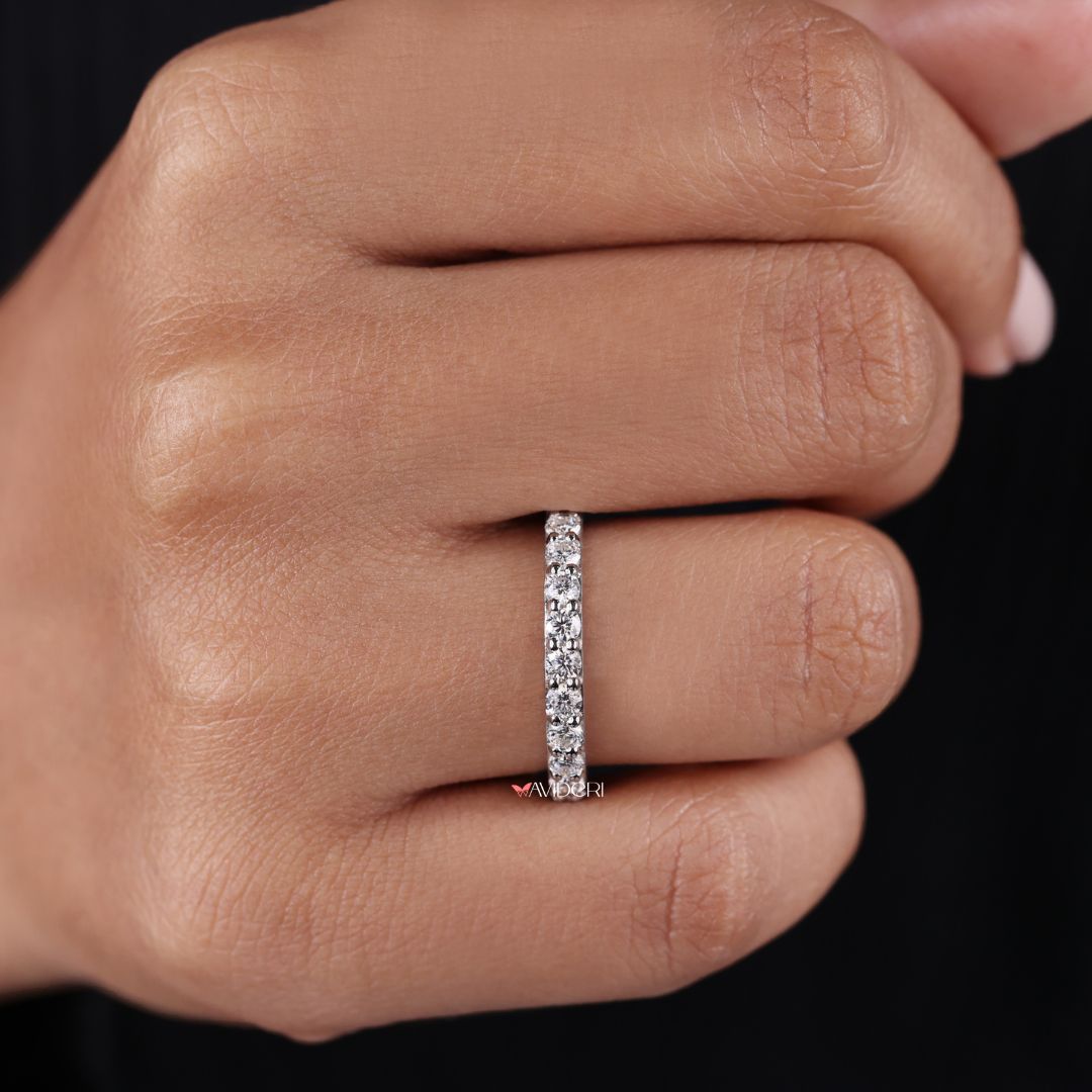Simple wedding band reflects minimal elegance and daily versatility in style.
