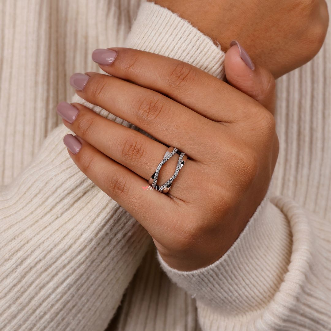 The wrap guard wedding band adds extra style and protection.