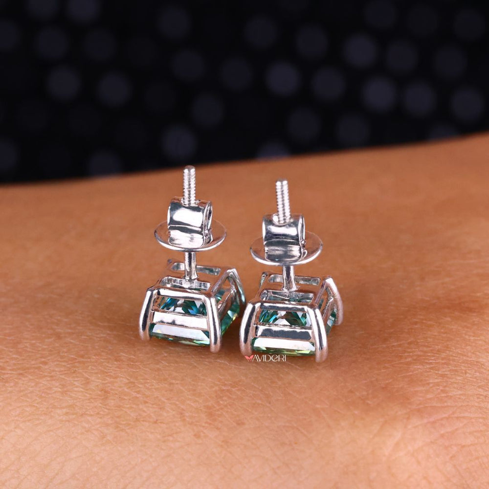 White gold earrings with 4 prong settings for a secure fit.