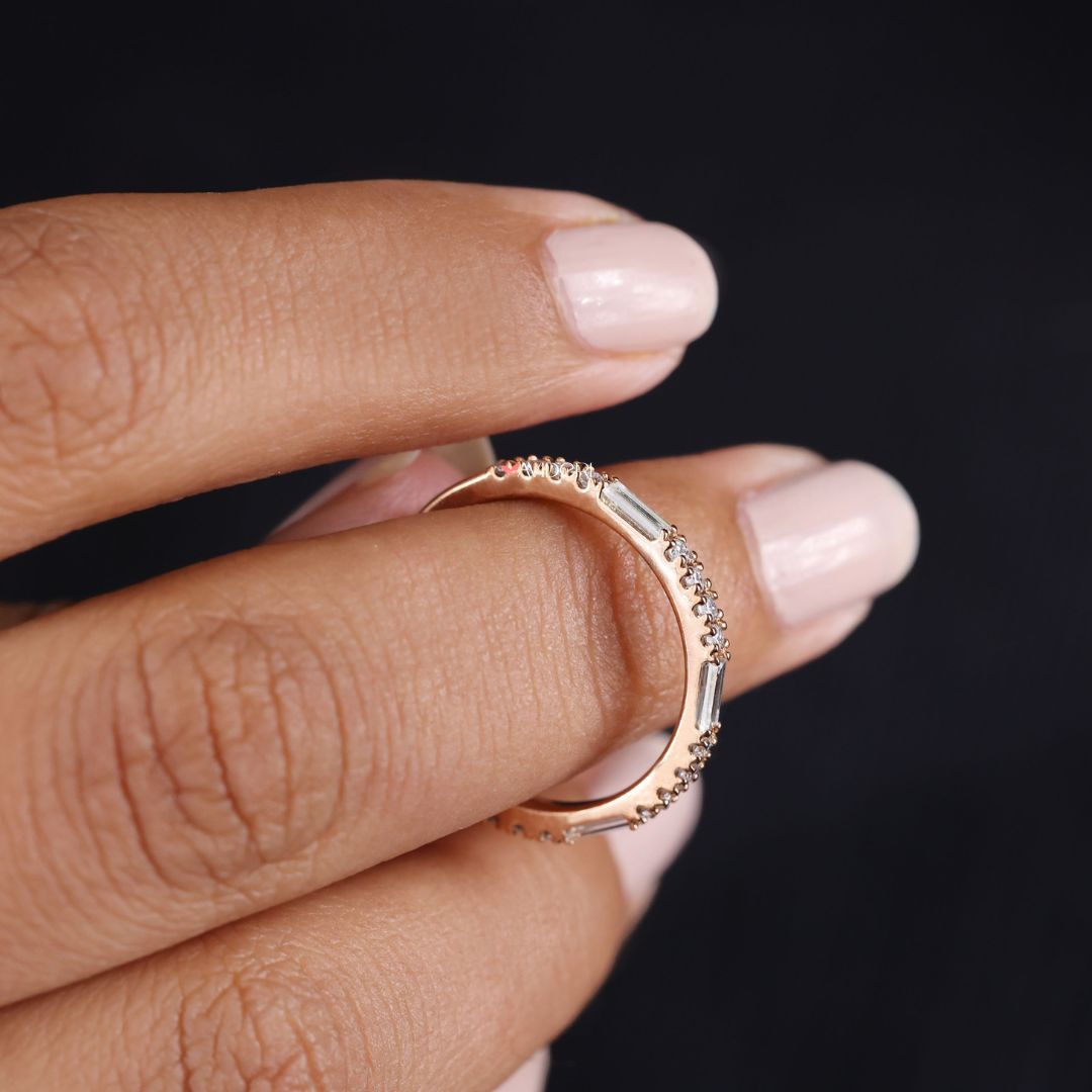 Rose gold wedding band glows with warmth and refined elegance.
