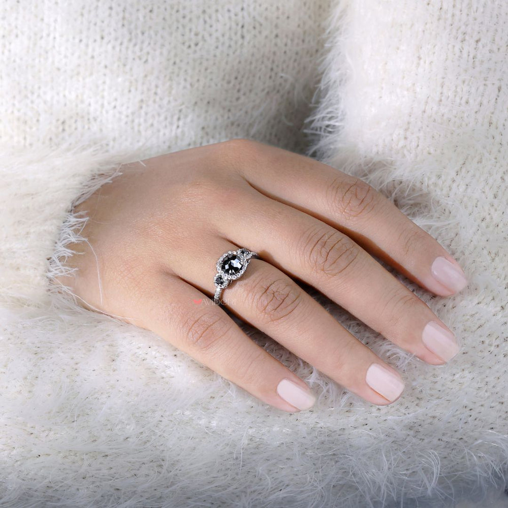 Three stone moissanite ring offering a balanced and elegant look.
