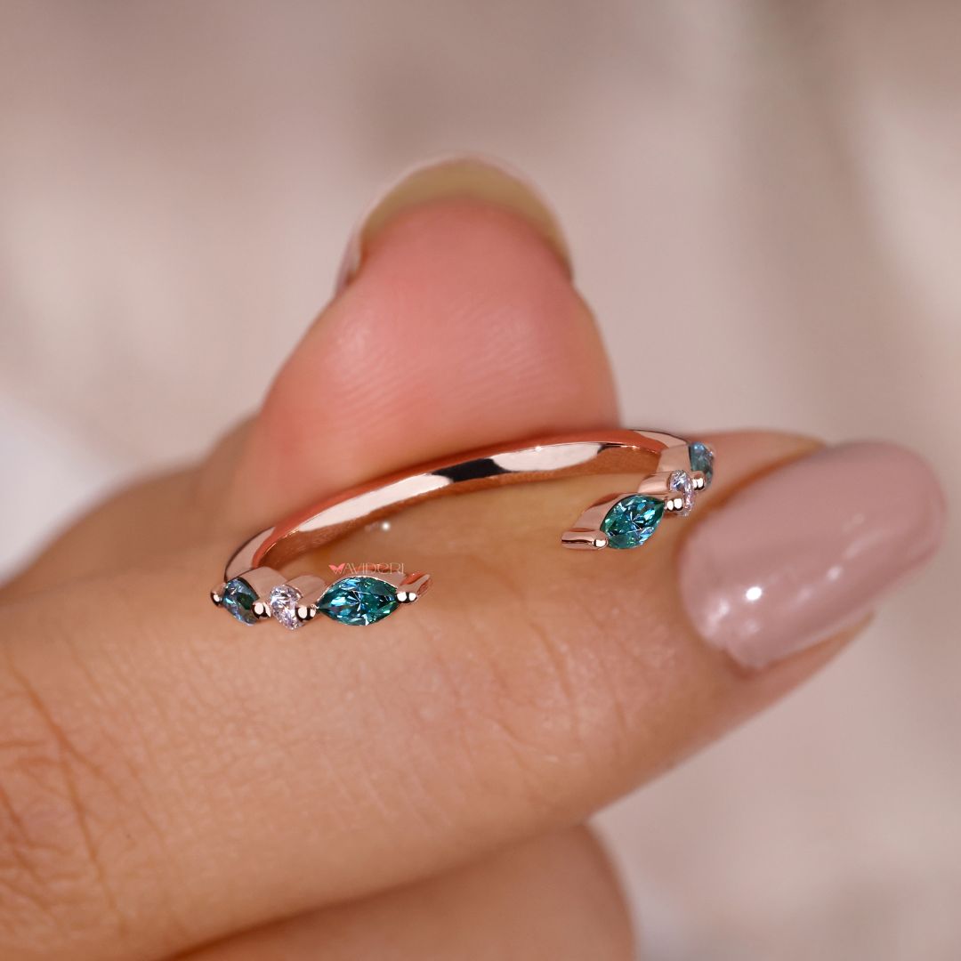 A shared prong wedding band enhances brilliance with small stones.