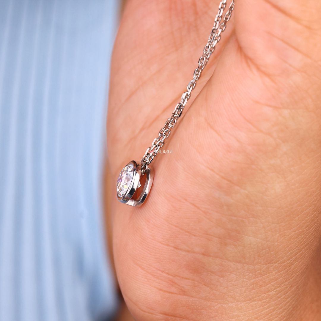 Moissanite pendant in a round cut design, perfect for daily wear.
