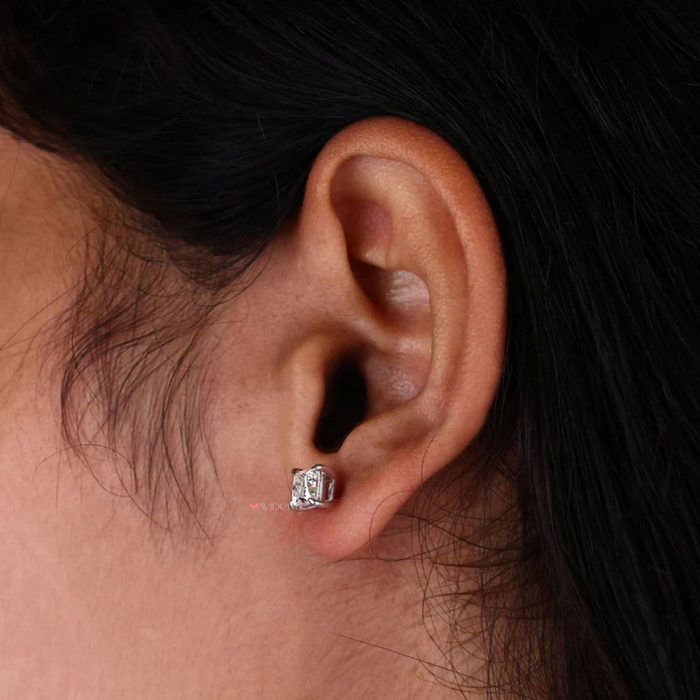These princess cut earrings offer a sleek, elegant design.