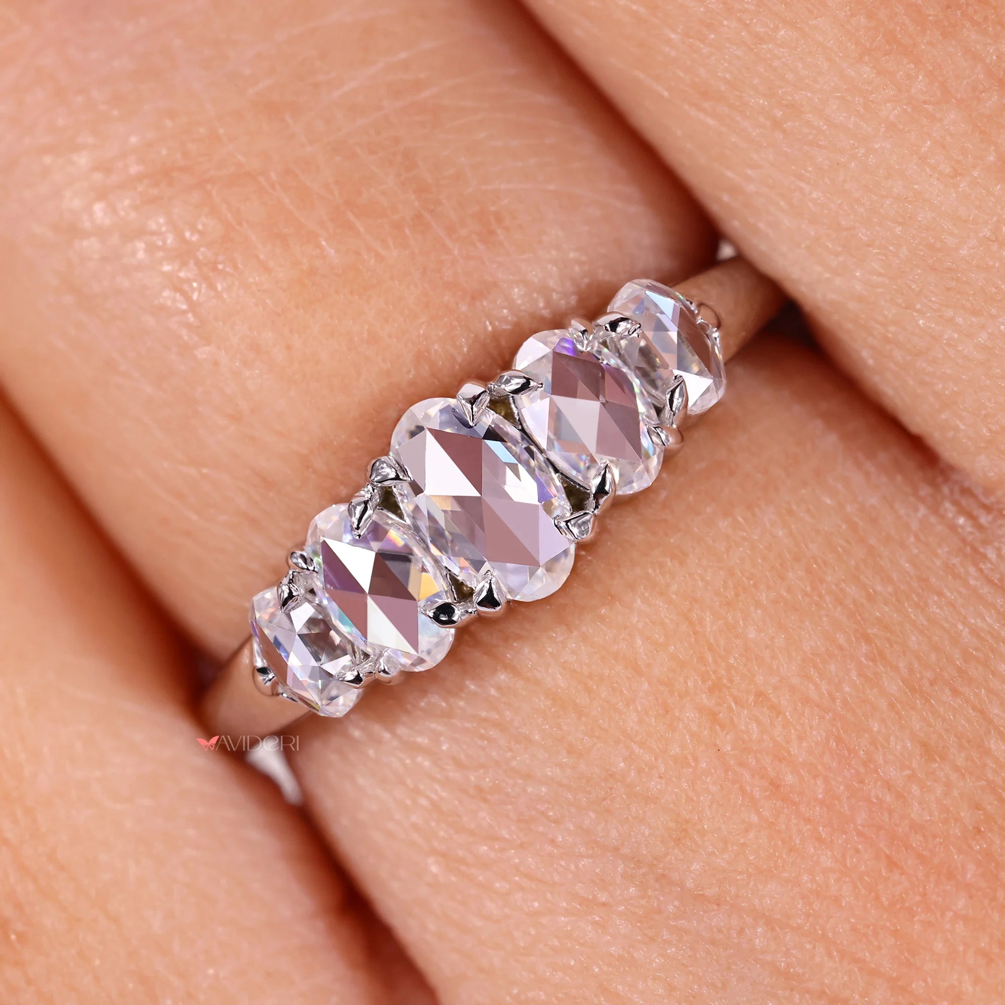 Oval rose cut band with white gold wedding band.