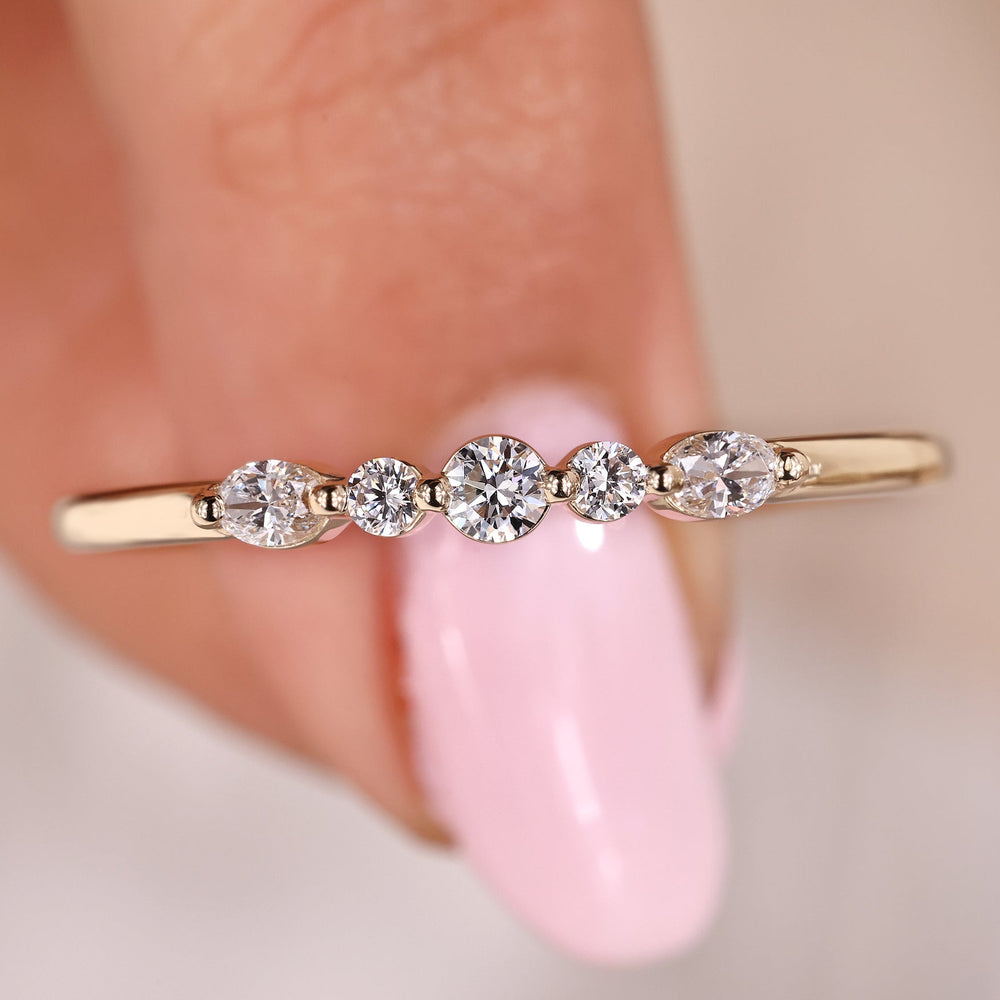 5 stone wedding band with shared prong wedding band.