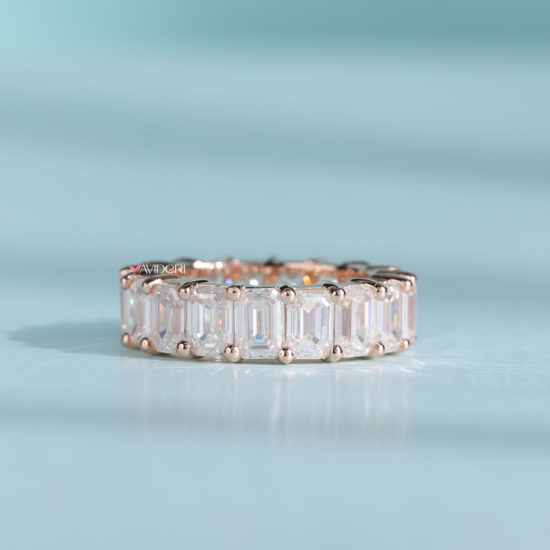 Emerald cut moissanite brings clarity and modern brilliance to your bridal look.

