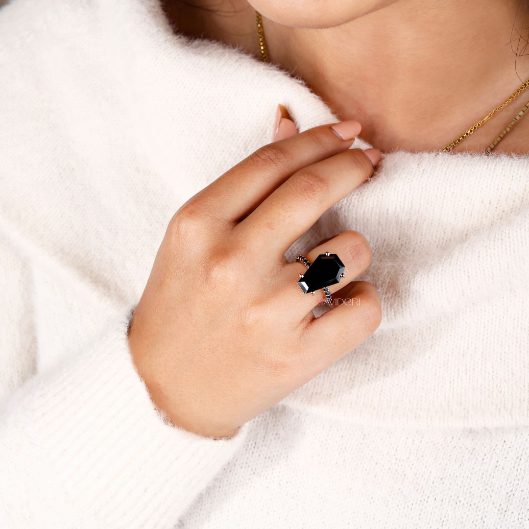 Pave setting ring with a coffin engagement ring for added sparkle.
