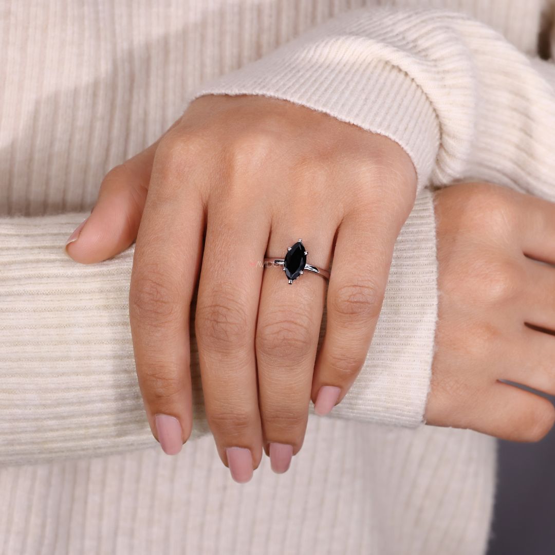 Avideri engagement ring featuring a stunning marquise moissanite stone.
