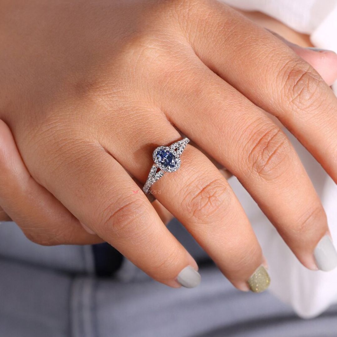 Custom engagement ring highlights oval cut engagement ring style.