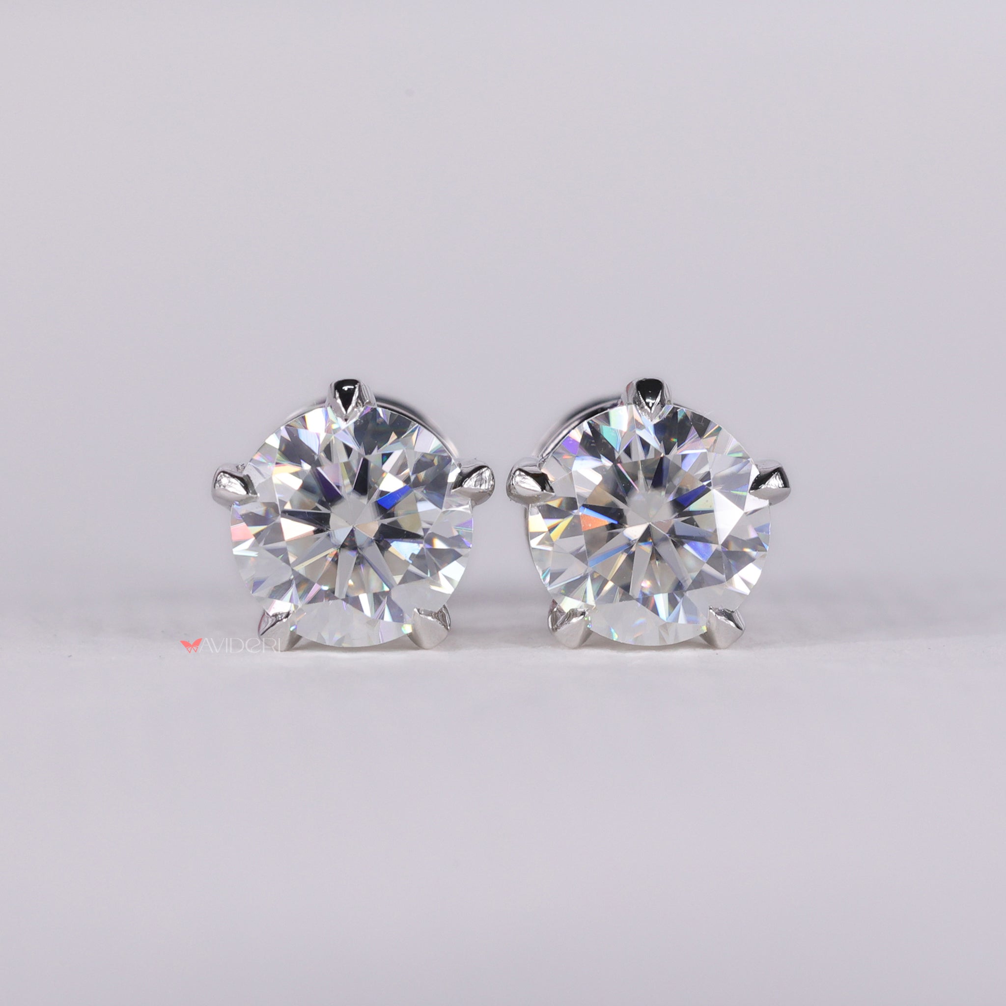 Five prong earrings provide a secure setting for the gemstones.