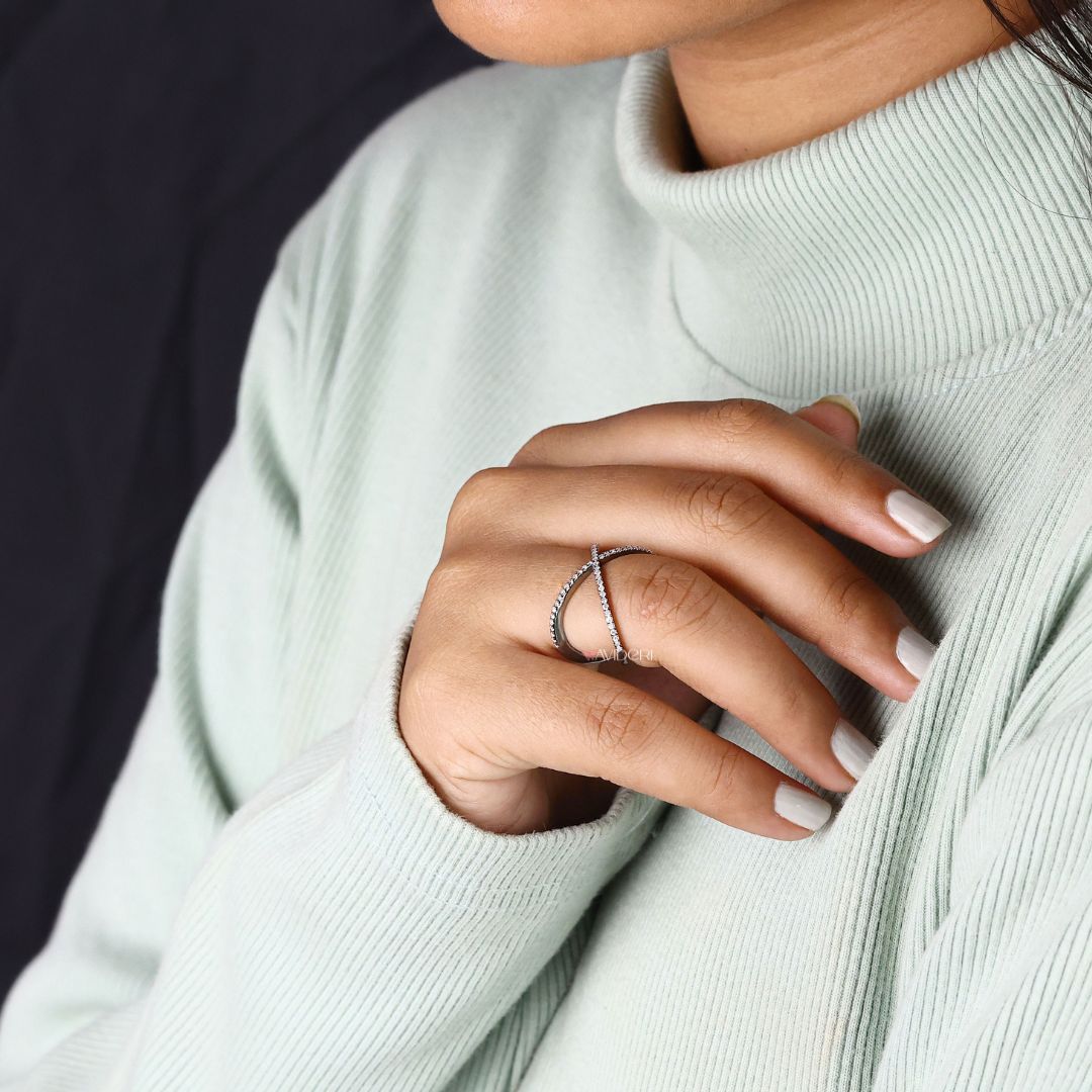 X Shaped wedding band features geometric elegance and an intricate crisscross pattern.
