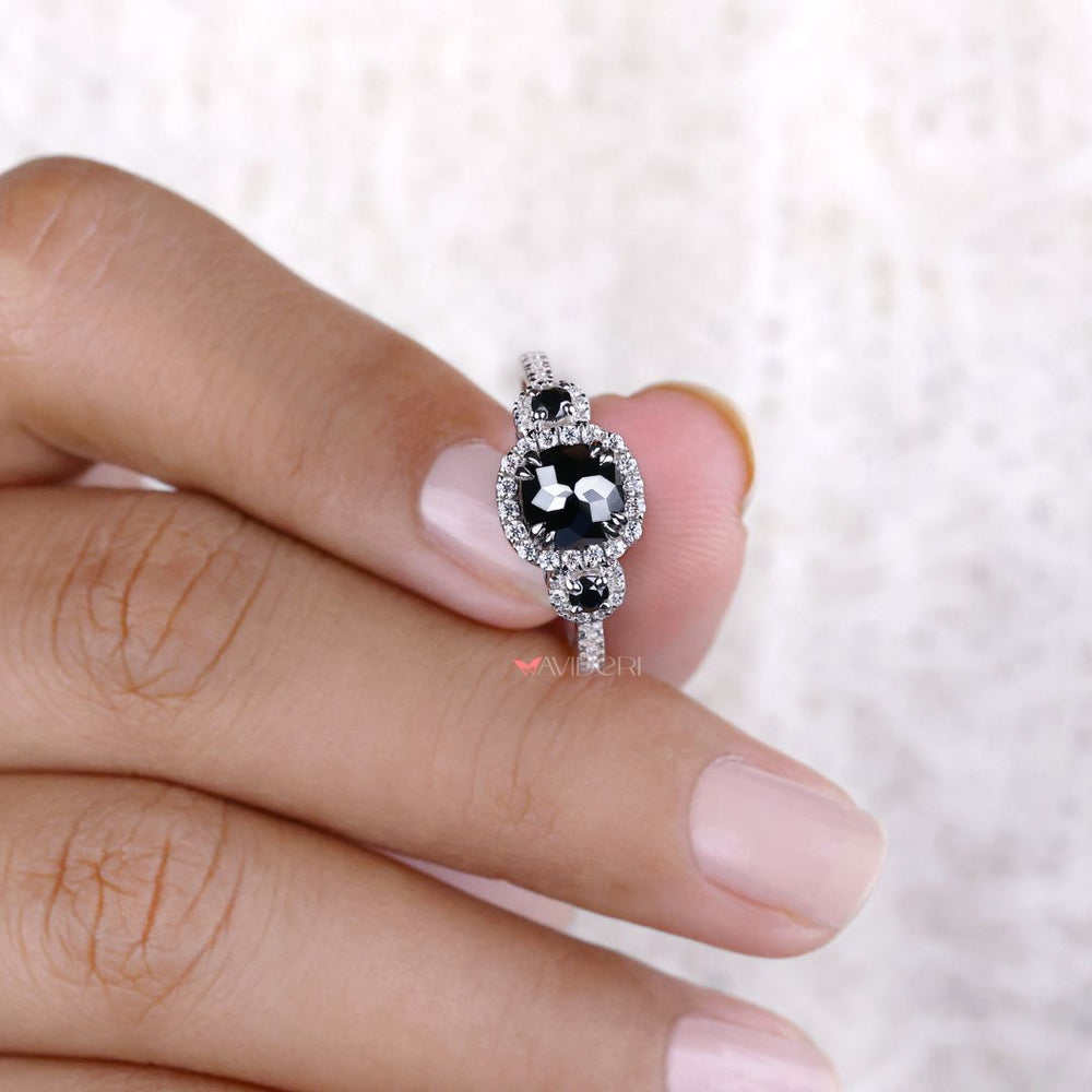 Cushion cut ring highlighted by a beautiful pave band engagement ring design.
