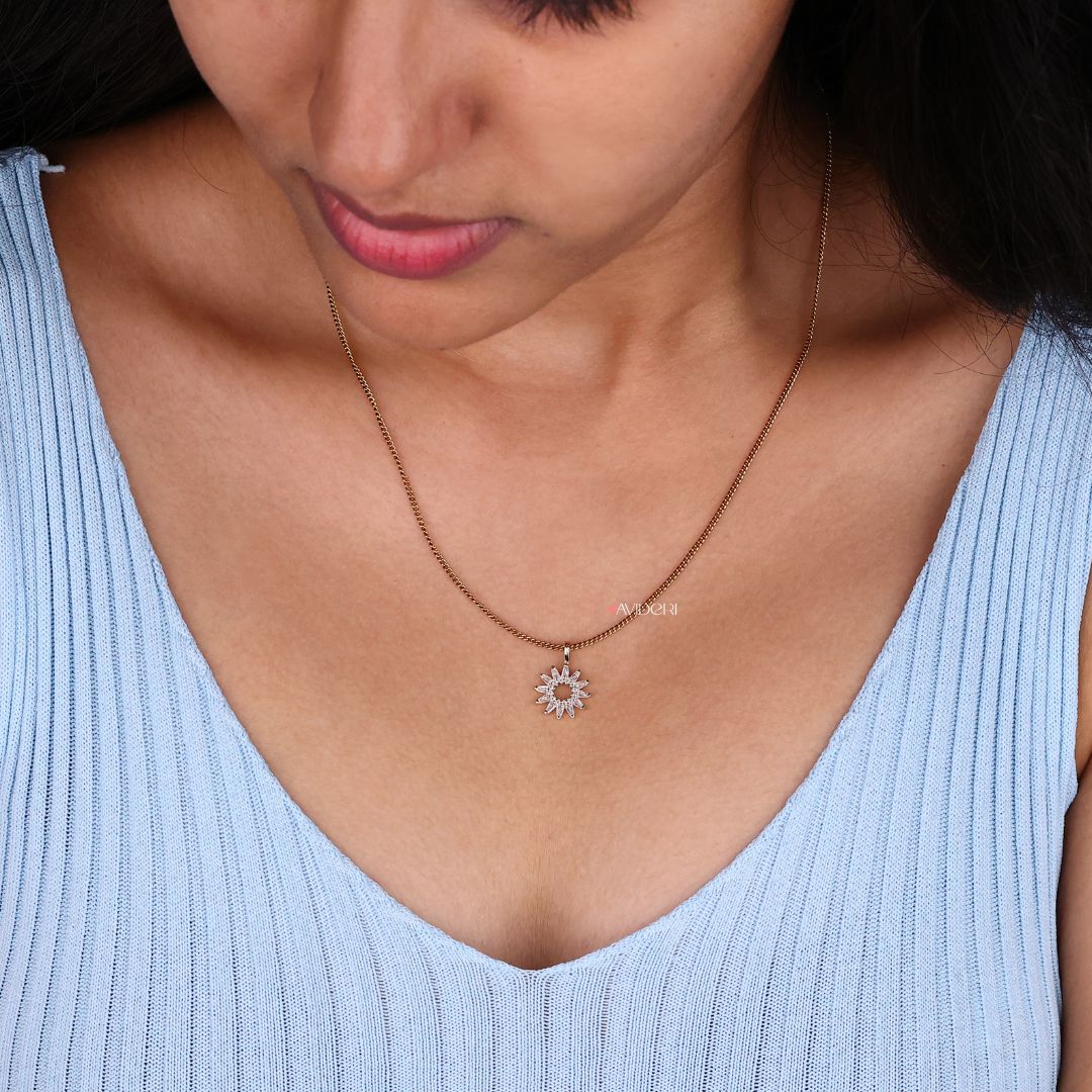 Rose gold pendant with a warm, rich tone.

