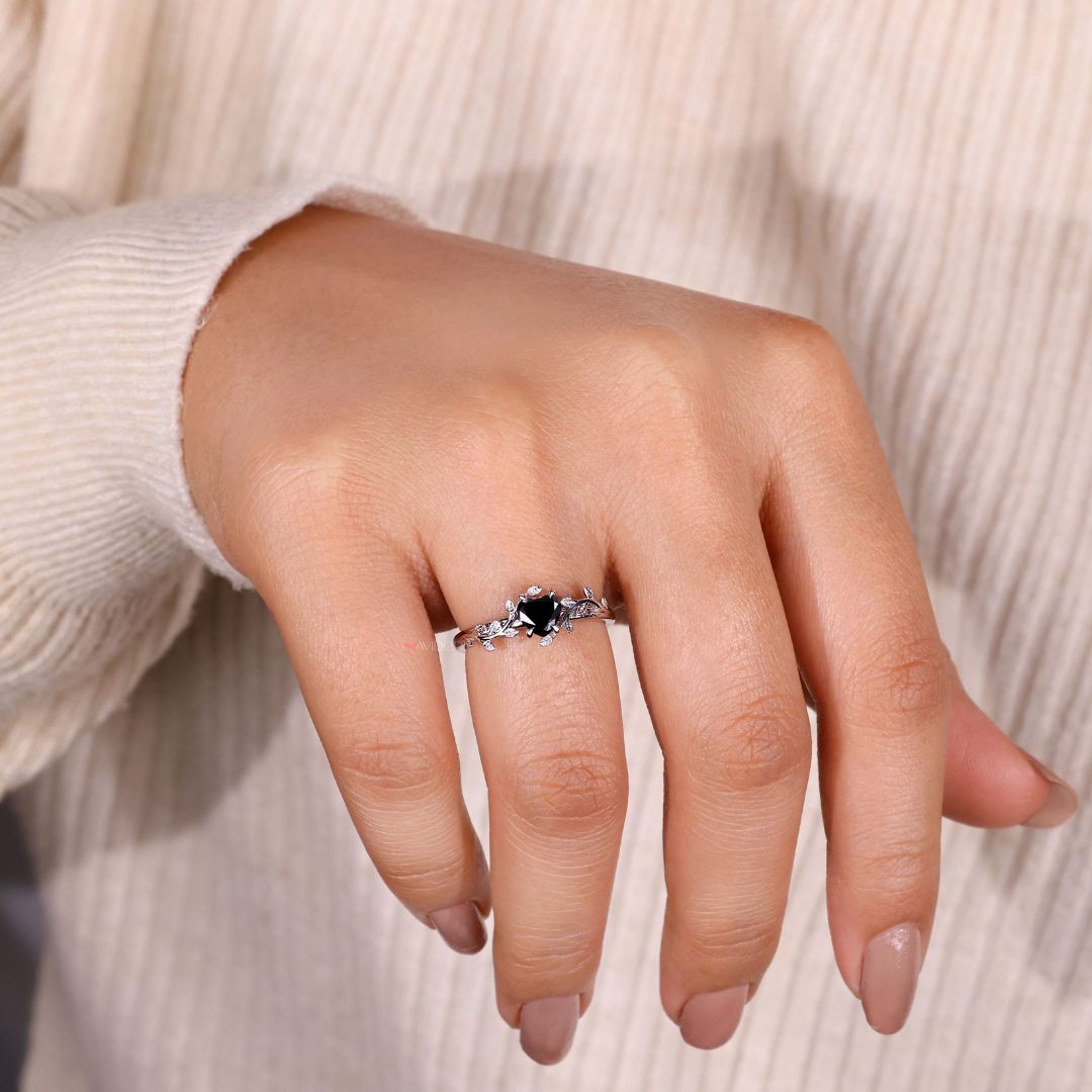 Heart cut ring paired with a leaf style wedding band for added detail.
