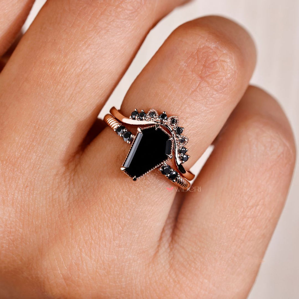 Vintage gold ring with a coffin engagement ring for classic beauty.