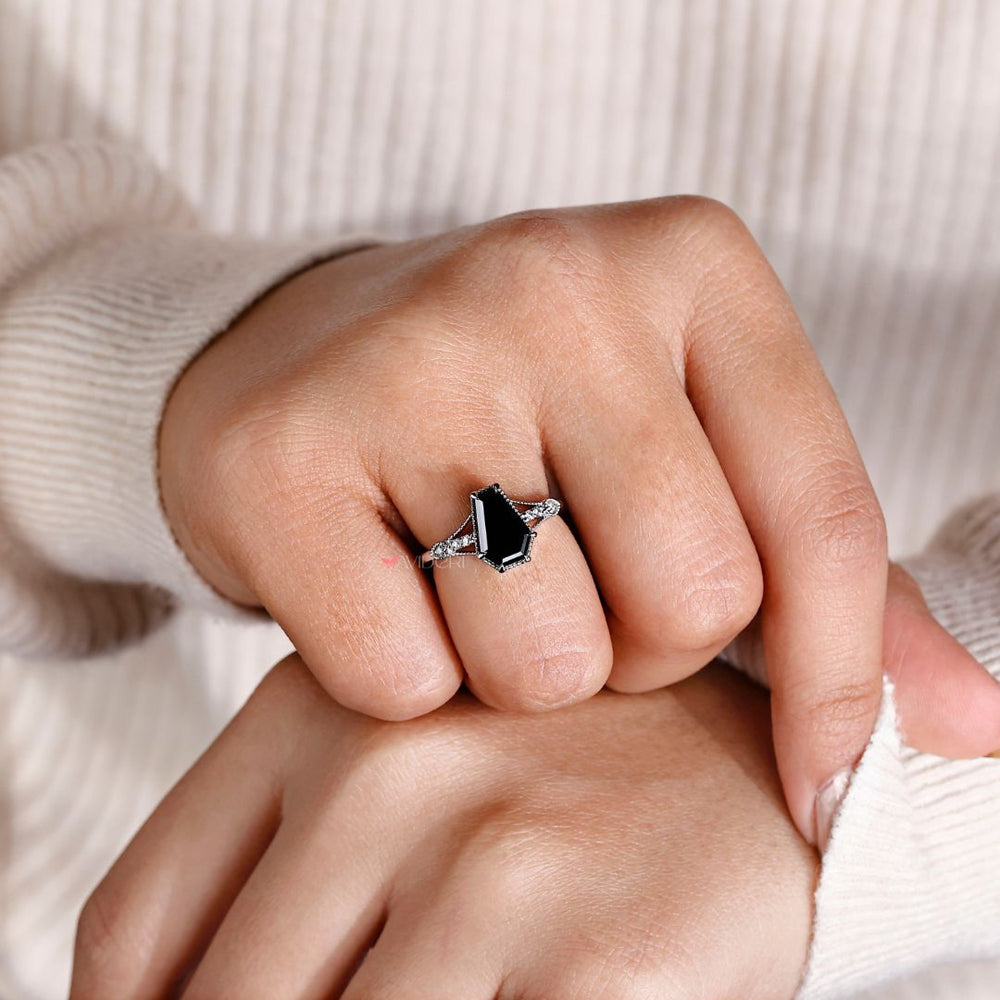 Coffin ring with a bold and striking look, perfect for any occasion.

