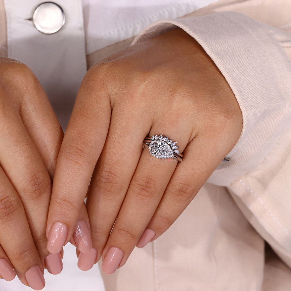 Curved wedding band fits flawlessly with statement engagement styles.