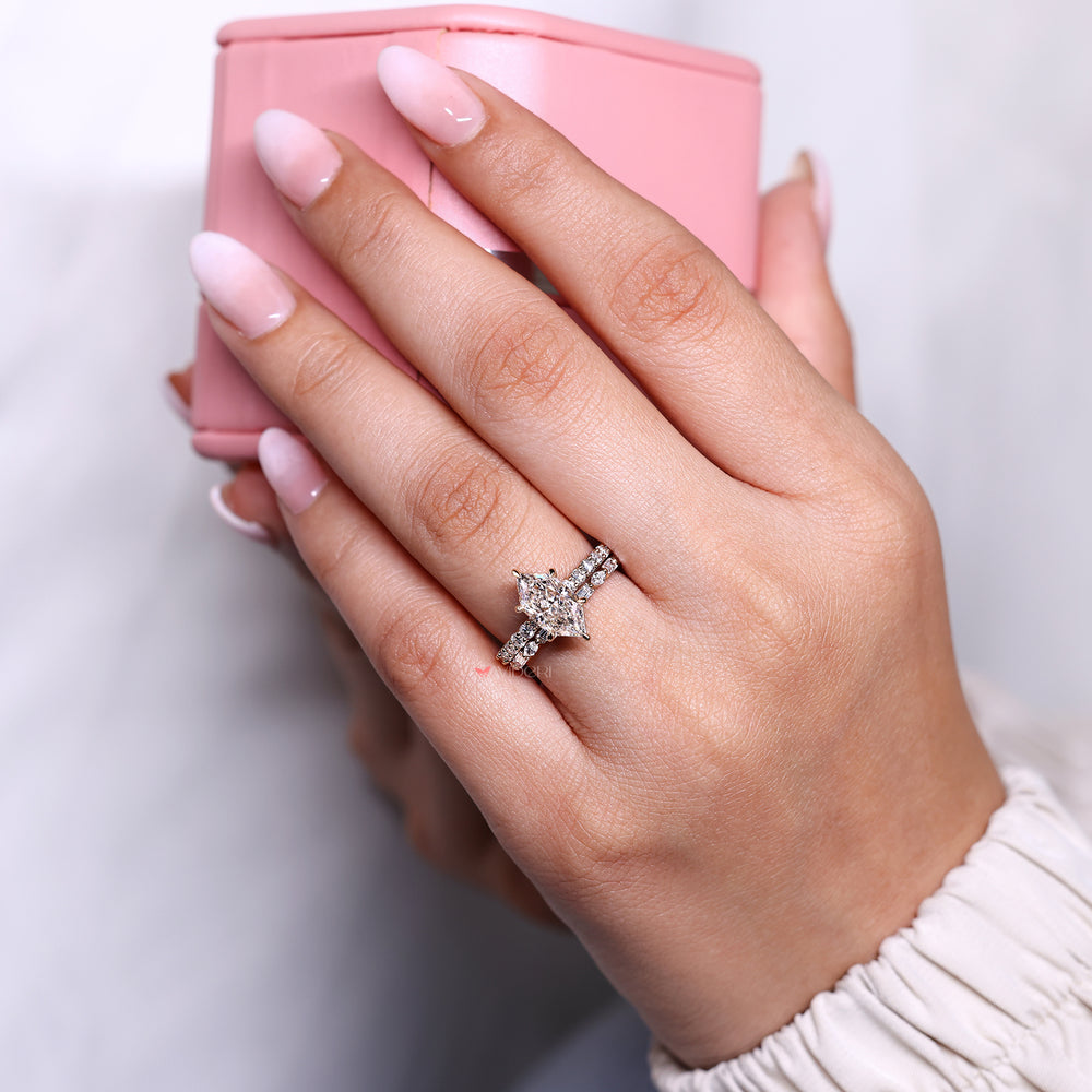 6 claw prong setting on dutch marquise engagement ring.