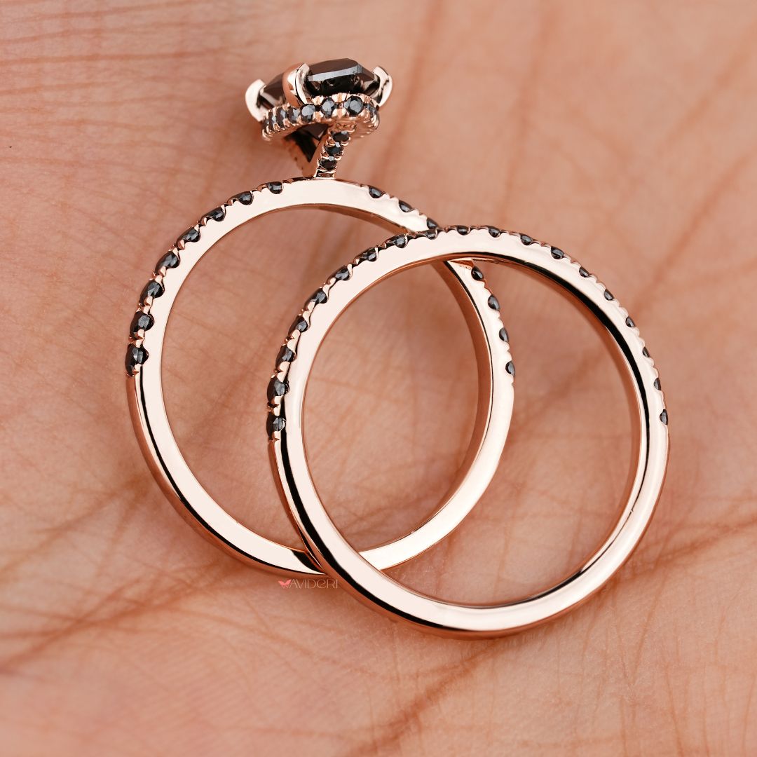 Rose gold ring featuring a marquise moissanite stone for a warm, classic appeal.