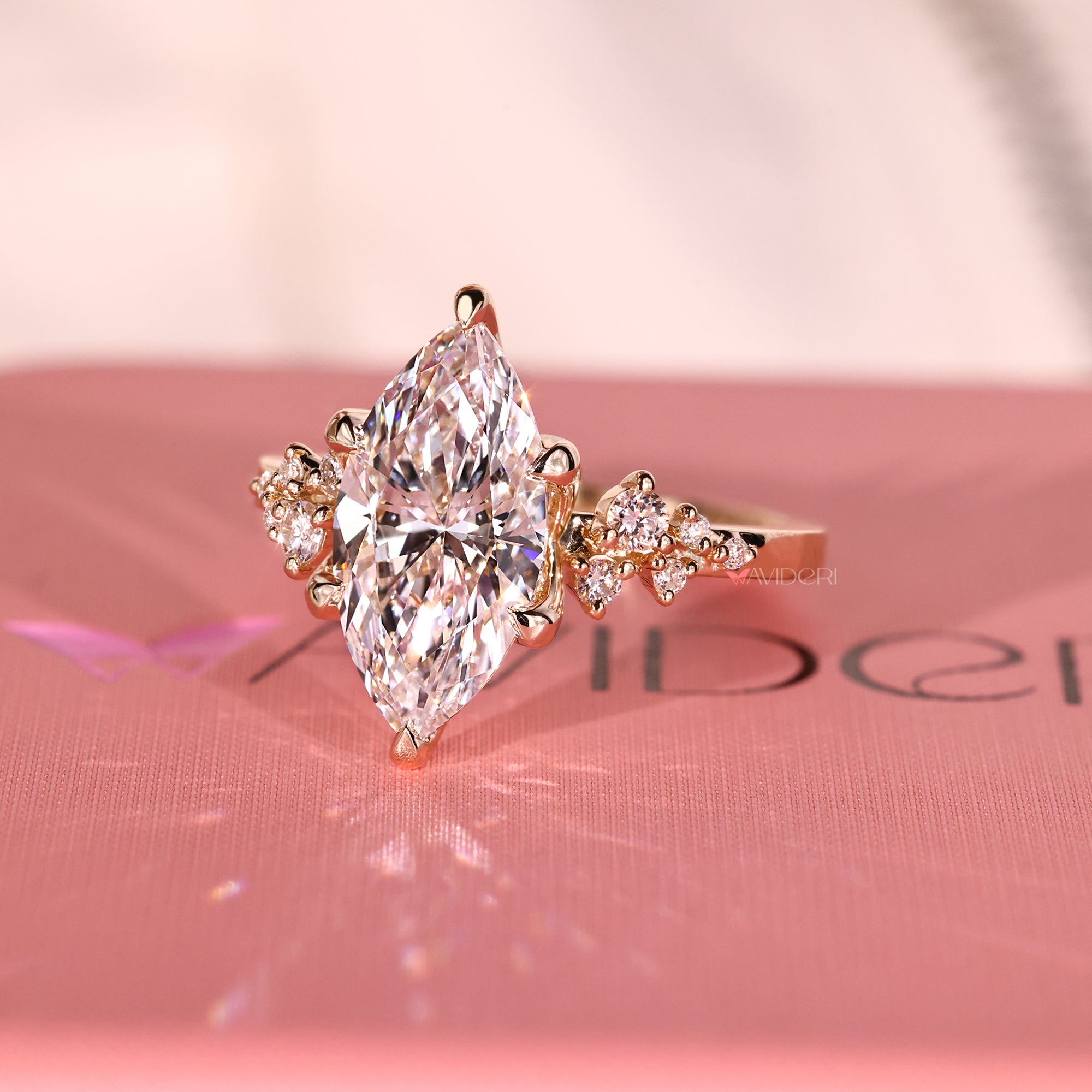 Six claw prong ring offering secure hold for the marquise diamond.