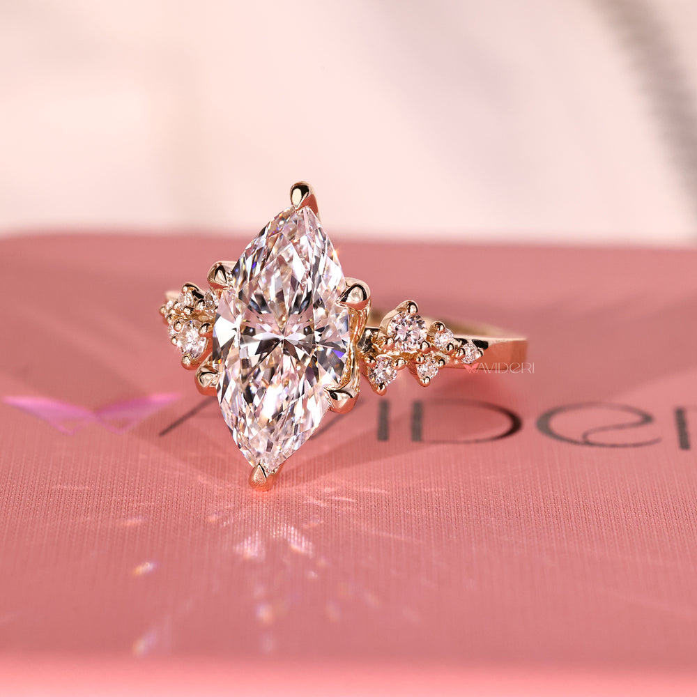 Six claw prong ring offering secure hold for the marquise diamond.