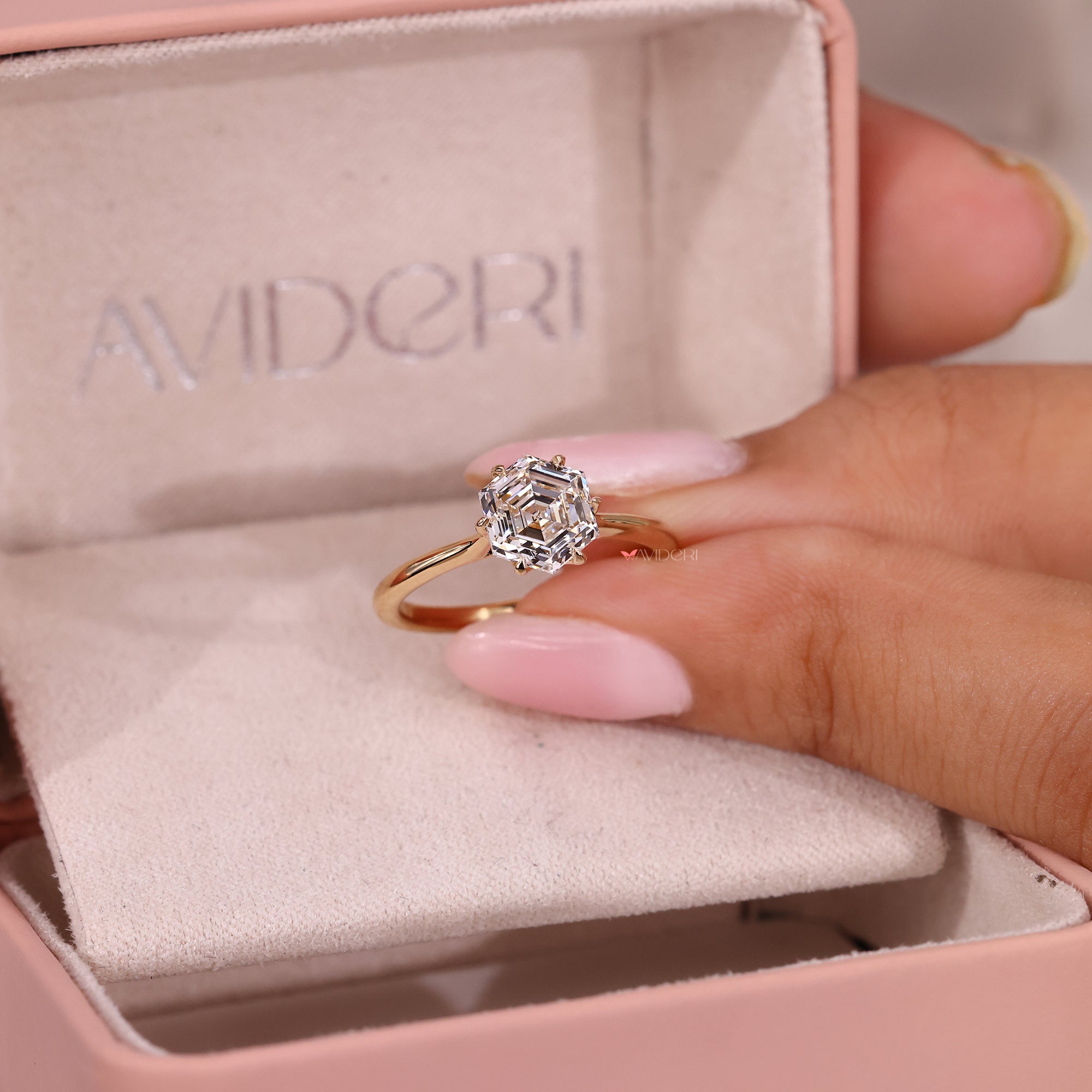 Solitaire engagement ring with cathedral setting engagement ring.