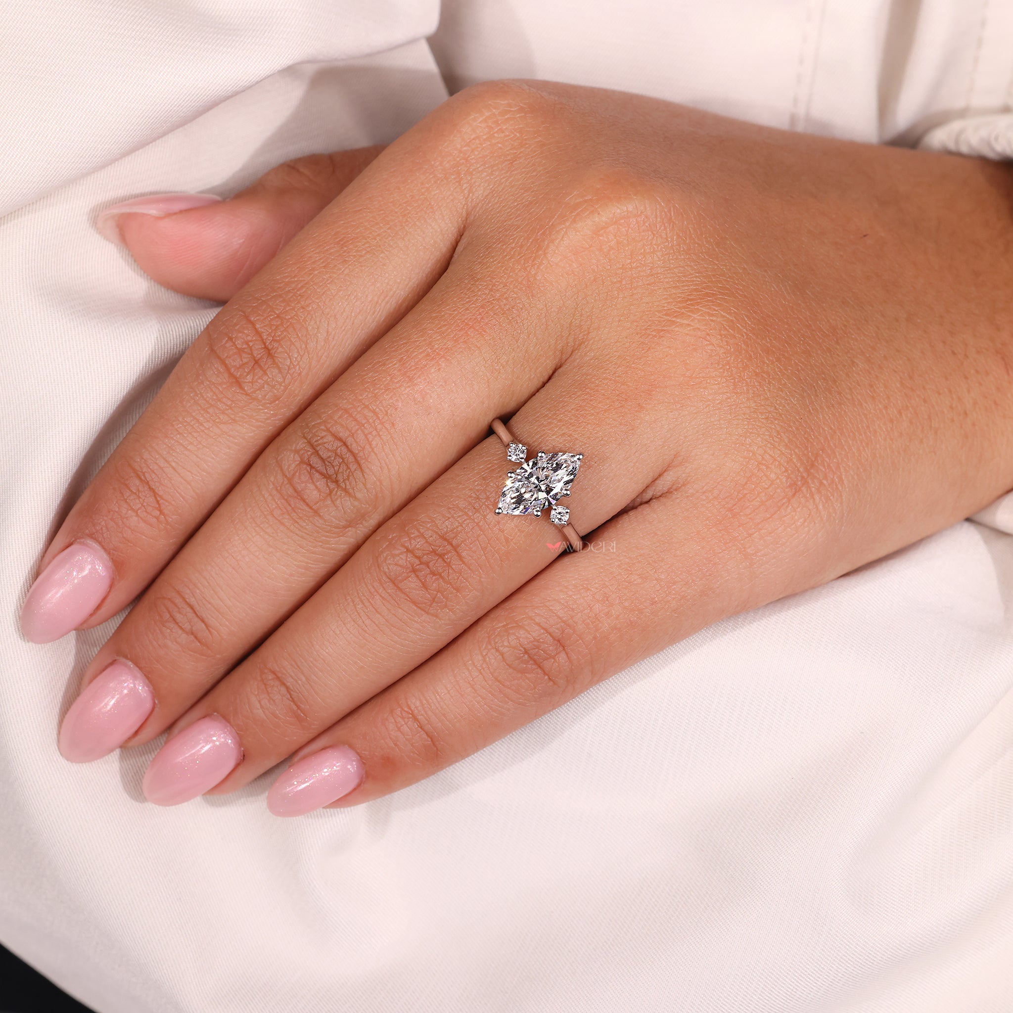 Handmade ring with round cut hidden halo and 6 prong setting.
