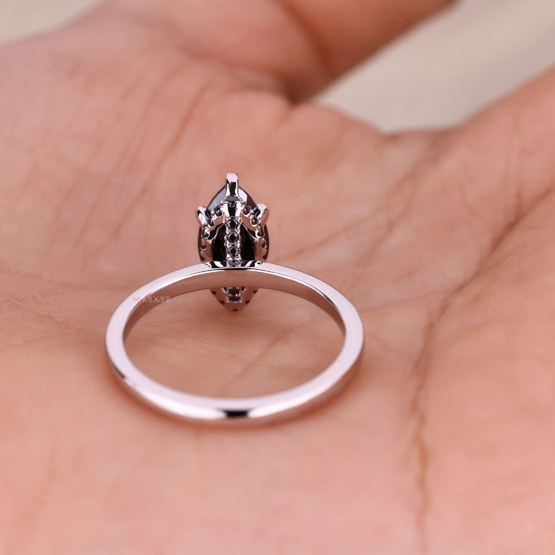 Marquise moissanite ring with a beautiful white gold engagement ring setting.

