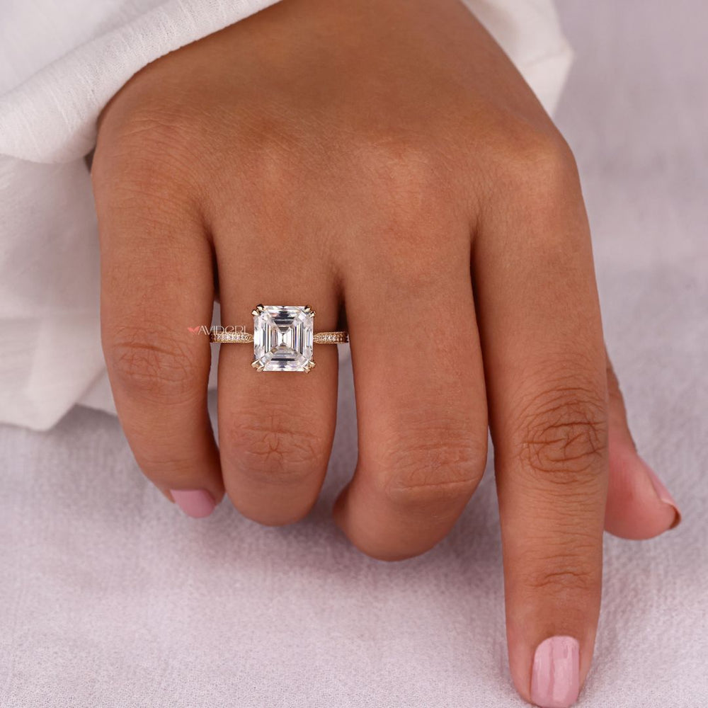 Double claw prong ring showcasing a moissanite center stone
