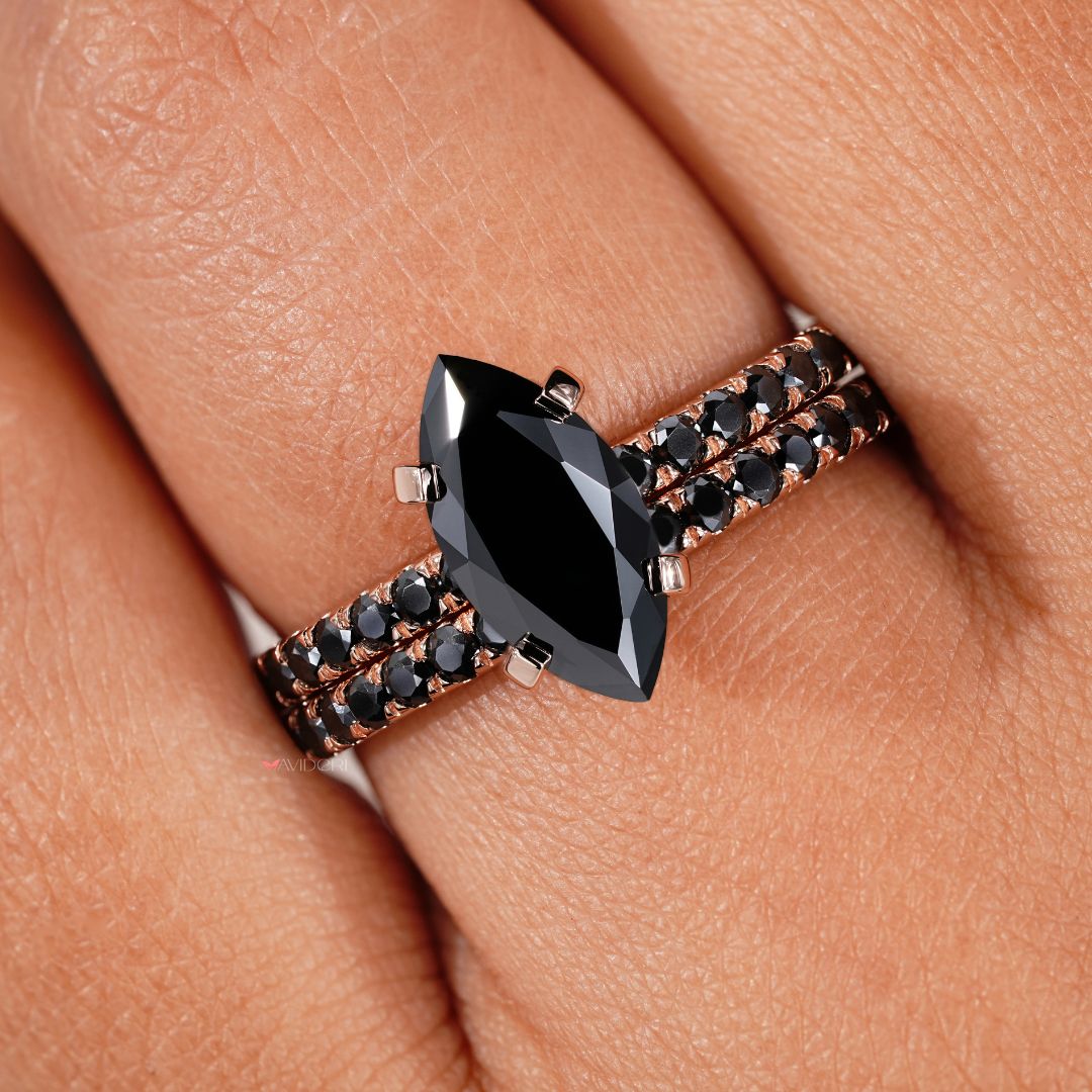 Black moissanite engagement ring with a stunning marquise centerpiece and timeless design.