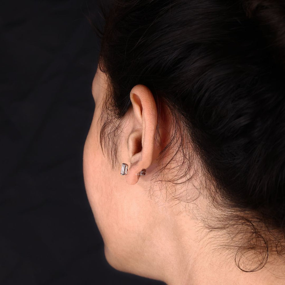 Emerald cut earrings provide sharp angles and timeless beauty.