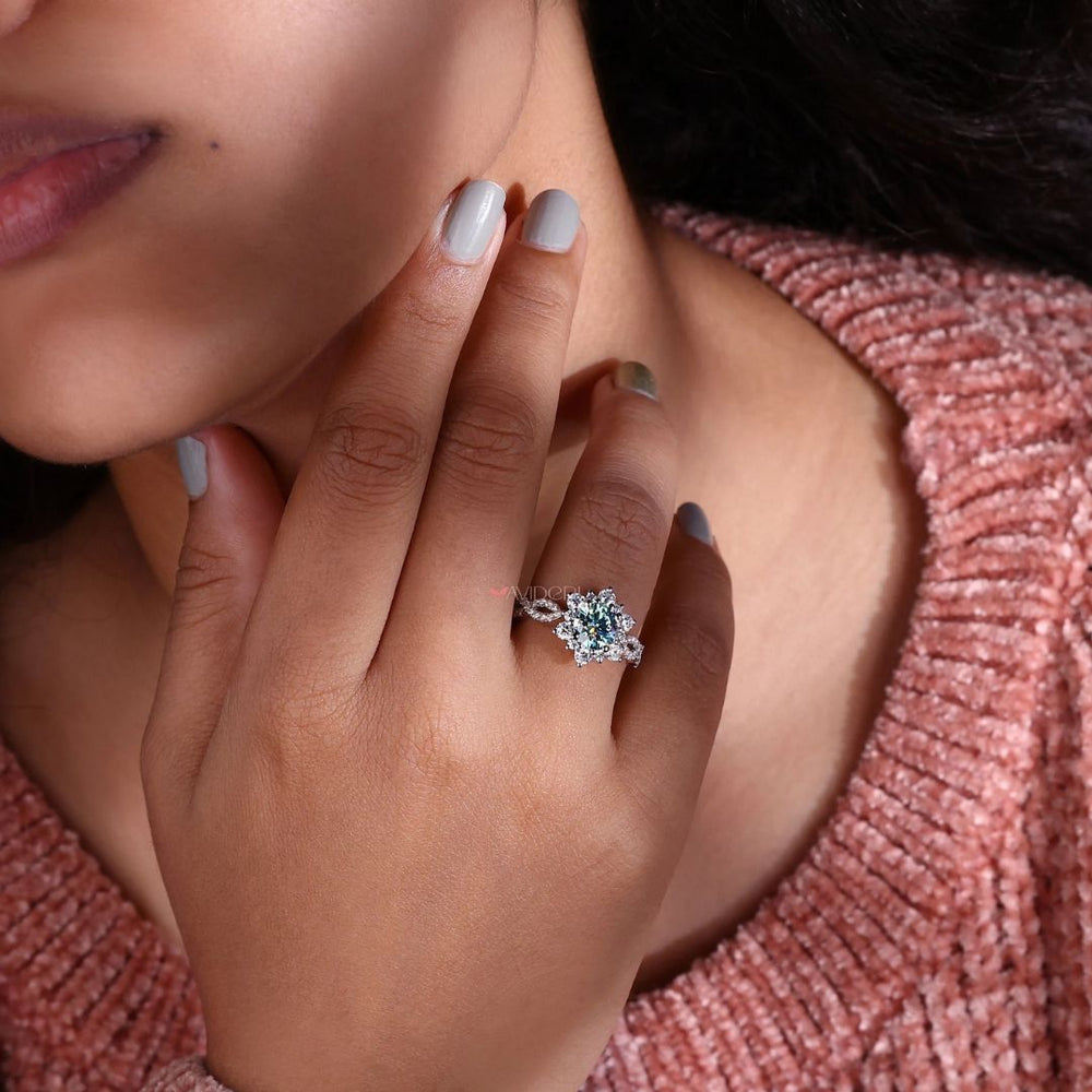 Pave band engagement ring featuring a round cut ring with a halo ring design.
