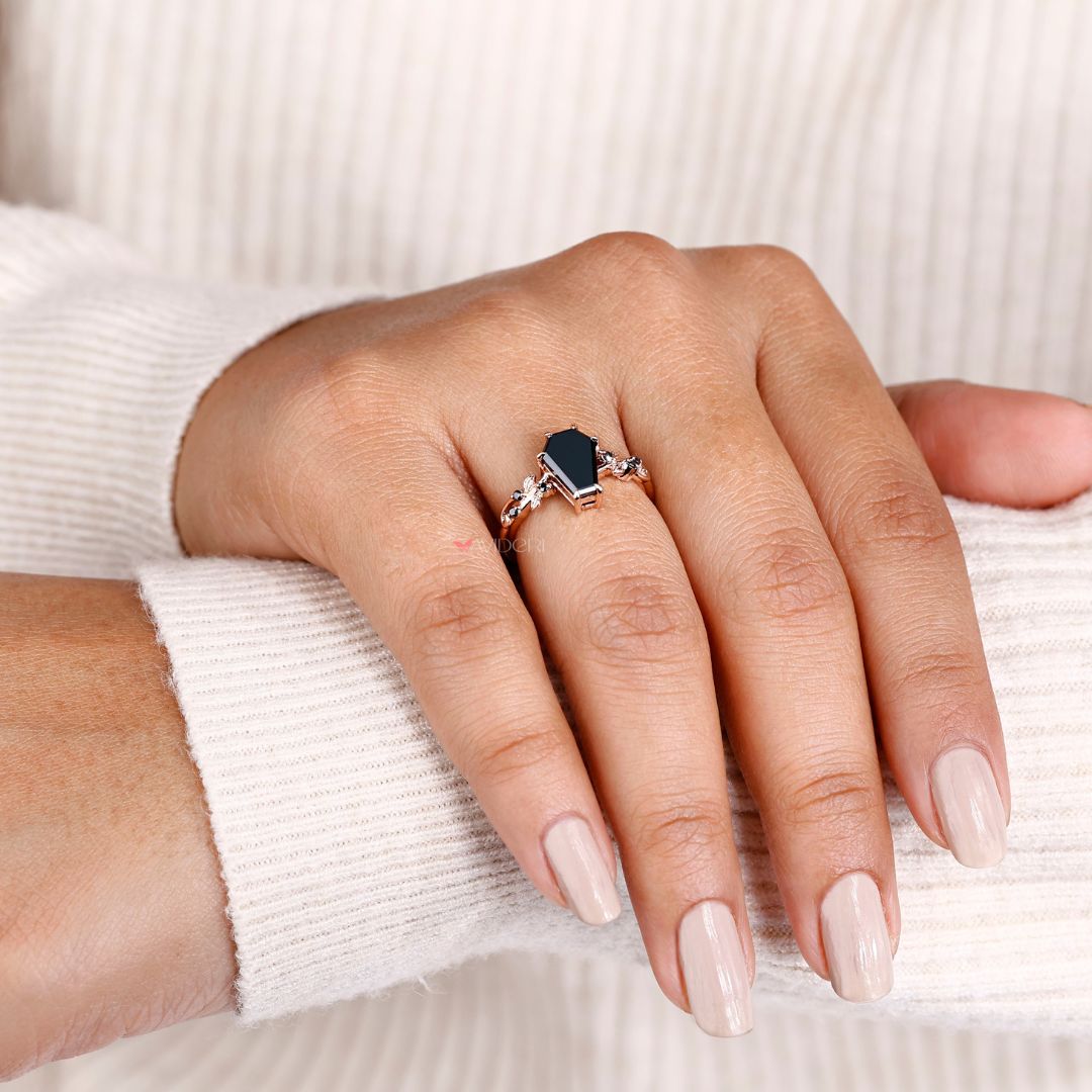 Vintage engagement ring with a unique coffin cut and modern twist.
