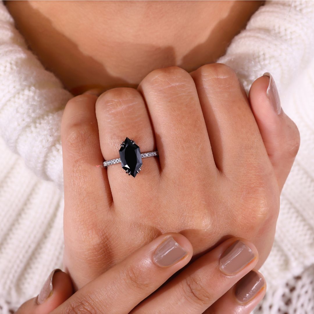Avideri engagement ring with distinct artistic style.
