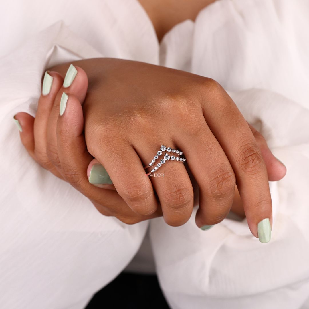 Designer wedding band blends intricate detailing with high-end craftsmanship for luxury appeal.
