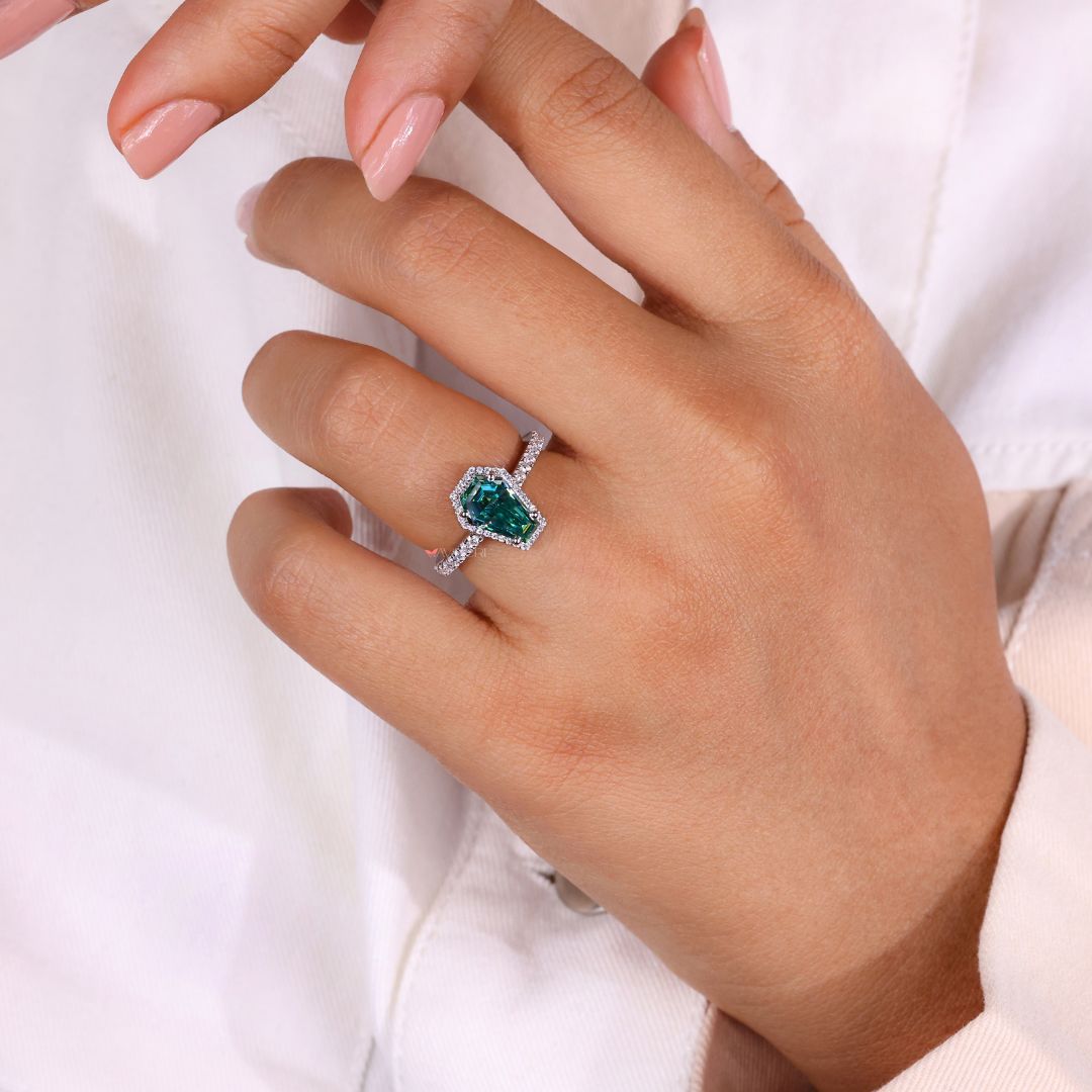 Cathedral setting ring elevated with delicate curves.
