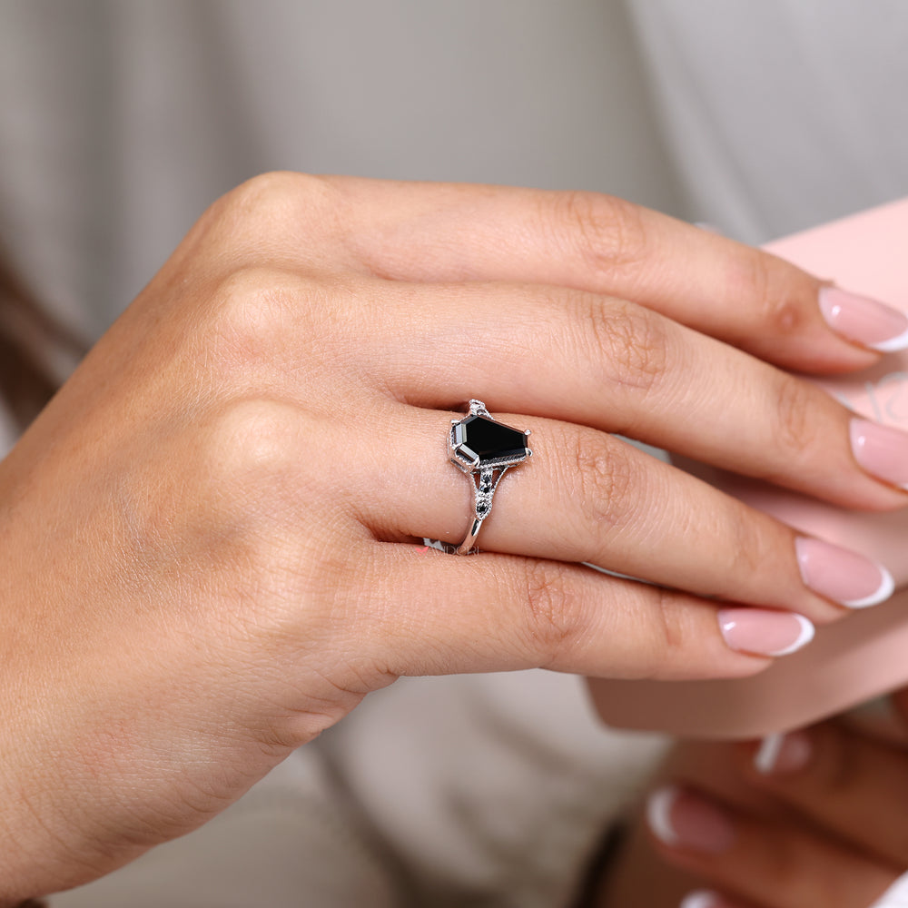 Black coffin cut ring with black stone ring.