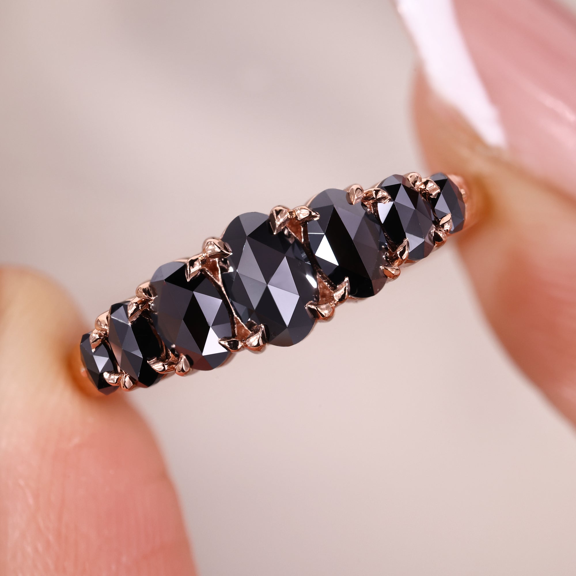 Oval rose cut wedding band with black stone wedding band.