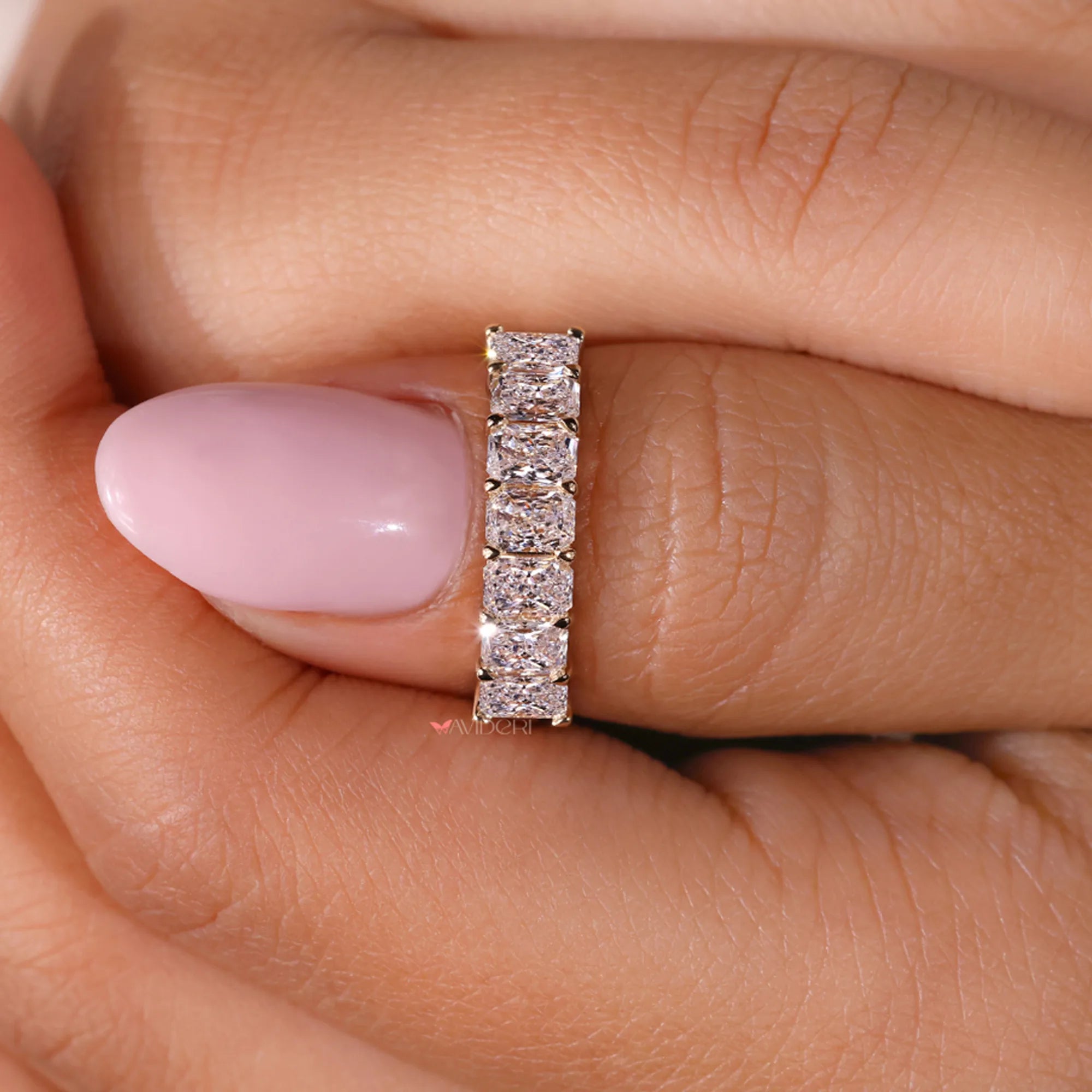 7 stone wedding band with seven stone radiant band.