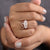 Oval cut ring paired with a marquise cut ring in a leaf style design.
