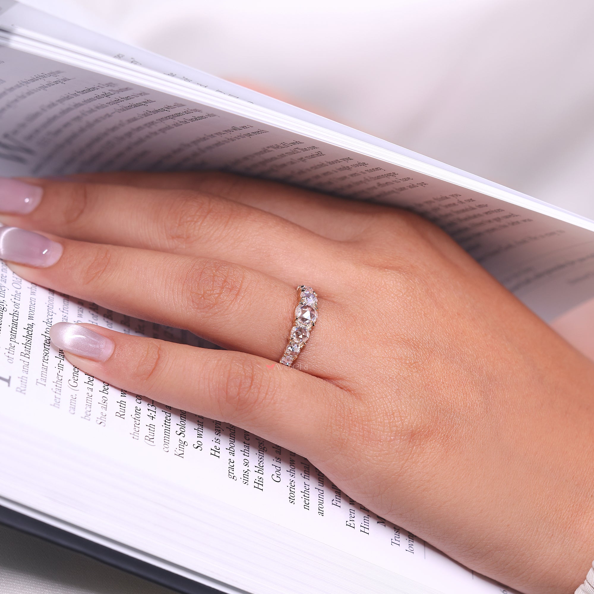 7 stone wedding band has seven sparkling stones in one row.
