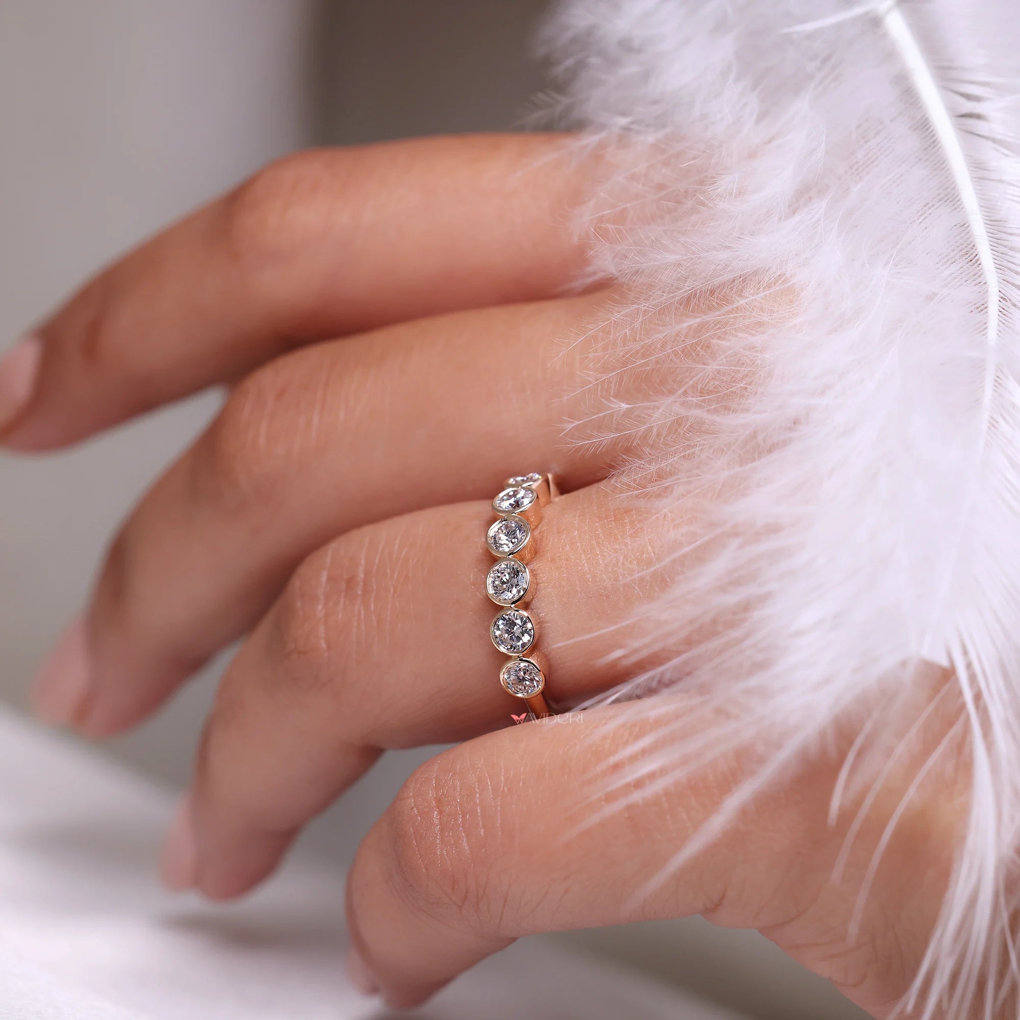 Half eternity band with seven stone band.