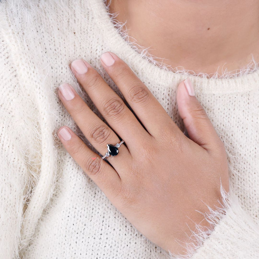 Pave ring setting with dazzling diamonds enhancing its brilliance
