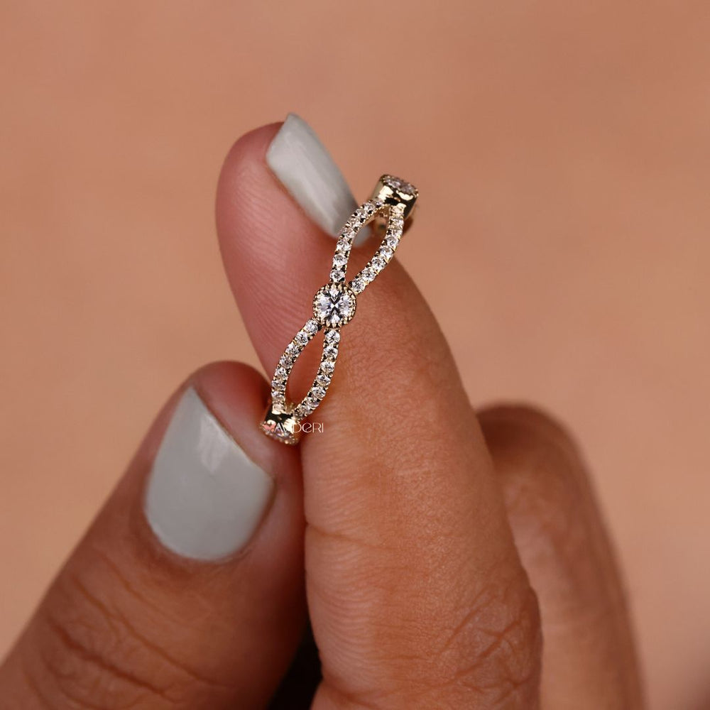 Round cut wedding band offers timeless elegance with brilliant round-cut stones.
