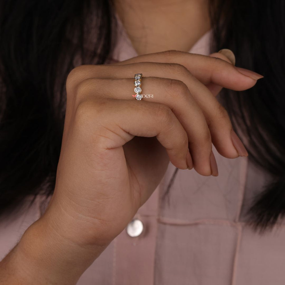 Half eternity wedding band offers balance and comfort with refined sparkle.
